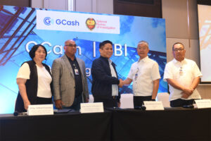 From left: Lawyer Maricor Alvarez-Adriano, GCash Chief Legal Officer, lawyer Gilbert Escoto, GXI Chief Legal Officer, Oscar "Renren" Reyes, G-Xchange Inc (GXI) President and CEO, lawyer Medardo de Lemos, NBI Director, lawyer Jose Justo Yap, NBI Deputy Director for Operations. (Supplied photo)