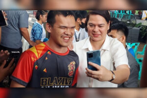 SELFIE WITH VP. Vice President and concurrent Education Secretary Sara Z. Duterte takes a selfie with a visually impaired student during the fourth founding anniversary of the City College of Davao in Davao City on Monday (Jan. 22, 2024). Duterte said the possibility of reverting to a June-March school calendar is ongoing. (PNA photo by Robinson Niñal Jr.)