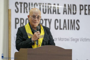 Retired Major General Melquiades Feliciano delivered the message of Sec. Carlito Galvez Jr. during the ceremonial awarding of structural claims spearheaded by the Marawi Compensation Board on April 17, 2024 at the Meranaw Cultural Heritage Center, MSU Marawi. (Photo by: DCC/PIA-10)