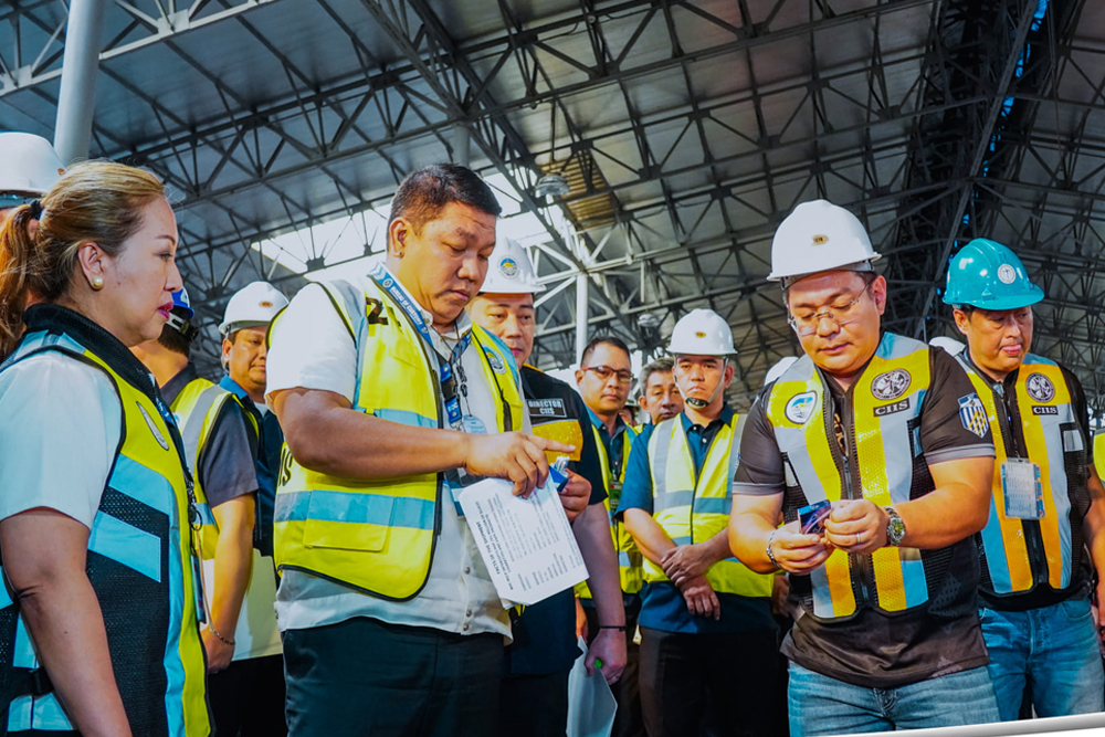 BUSTED. Customs officers at the Manila International Container Port account for smuggled cigarettes discovered inside three containers during a spot examination on Tuesday (May 14, 2024). The examination yielded a total of 5,268 master cases of assorted cigarettes and heat sticks worth PHP791 million. (Photo courtesy of BOC)